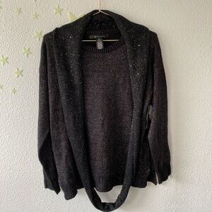 Black with silver sparkly details sweater comes with removable infinity scarf.